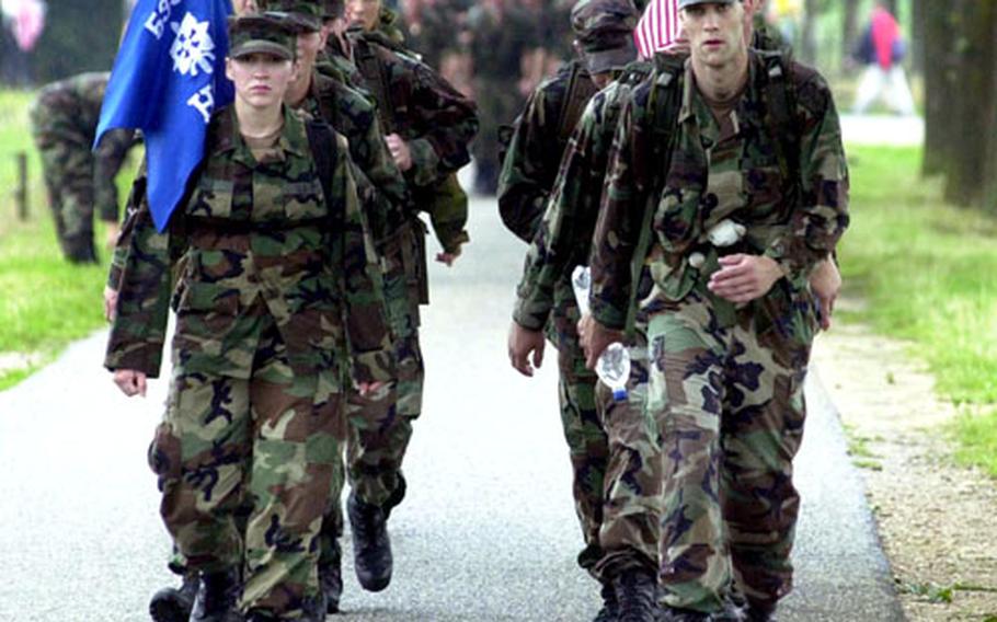 Members of the 66th Military Intelligence Group from Darmstadt, Germany, march through the Dutch country-side in a previous International Four Days March of Nijmegen. This year’s edition was cancelled after the first day of marching due to the heat.