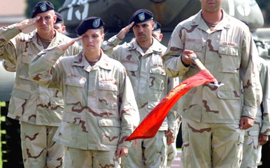 Soldiers of the 635th Movement Regulating Detachment salute during the welcome home ceremony. From left to right are Staff Sgt. Paul Iorio, 1st Lt. Jodi Roberts, Staff Sgt. Eliezer Casas and Pfc. Zack Davis.