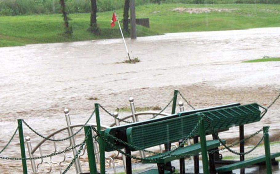 Floodwaters ravaged the Camp Casey golf course when more than eight inches of rain fell July 12.