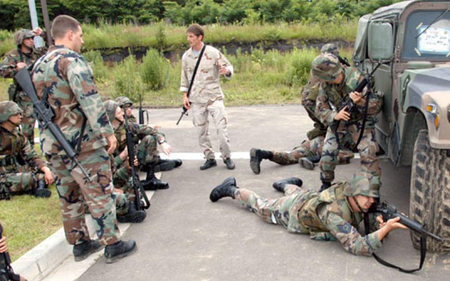 Misawa Air Base airmen practice convoy operations.