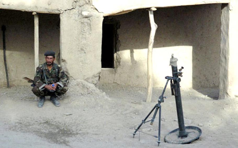 An Afghan National Army soldier keeps guard at an outpost near Gaza in northern Afghanistan on Saturday.
