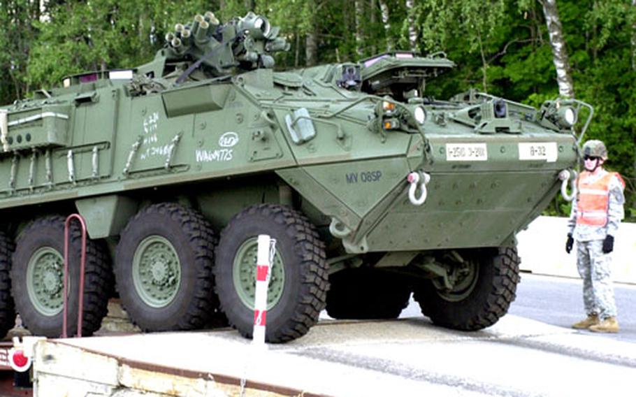Stryker armored personnel carriers belonging to the 2nd Cavalry Regiment arrive at Vilseck, Germany, railhead on Friday.
