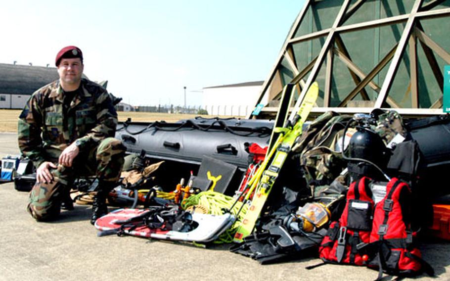 Master Sgt. Ken Howk showcases some of the equipment the U.S. Air Force’s 56th Rescue Squadron uses for its search-and-rescue missions.