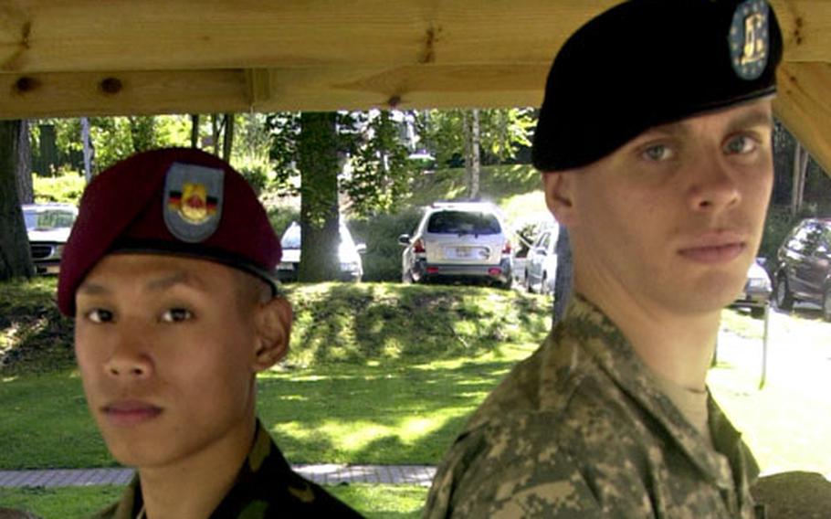 Sgt. James Halog, left, the 2005 U.S. Army Europe soldier of the year, and Spc. John Emmett, the 2006 USAREUR soldier of the year. The 21st Theater Support Command in Kaiserslautern, Germany, has taken home USAREUR soldier of the year honors for the past three years.