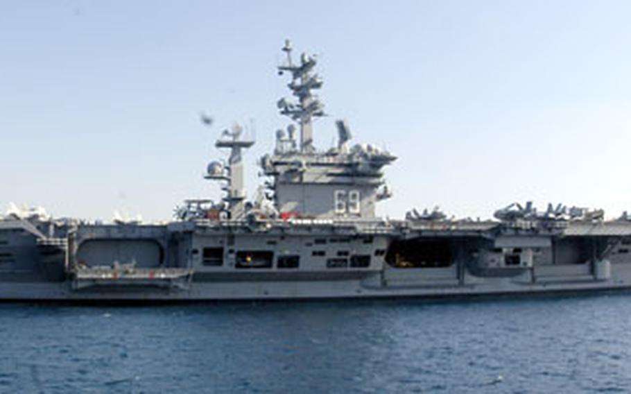 The aircraft carrier USS Eisenhower, anchored about a mile from the downtown port of Naples, Italy during port visit on Tuesday.