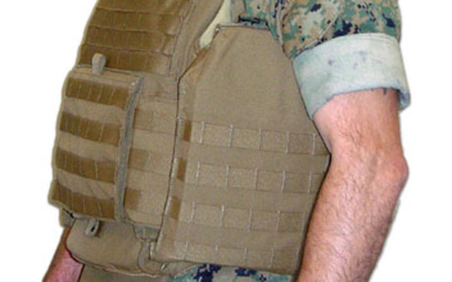 The Modular Tactical Vests, while slightly heavier, are said to fit better, and will provide more protection to the side torso, lower back and kidney area, according to Marine officials.