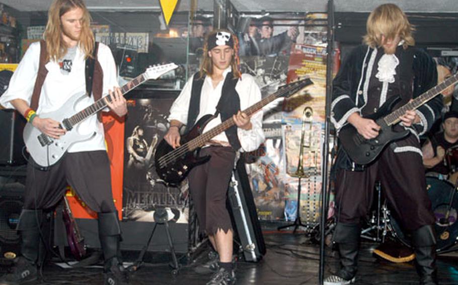 Cambridge-based band Once Forgotten jams during Saturday’s Halloween concert at the 48th Avenue Community Center at RAF Lakenheath.