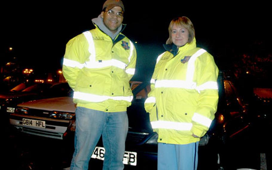 Capt. Tony Phillips and Master Sgt. Angela Smith kept airmen safe last Saturday night. The two were participating in a program that provides safe transport for airmen who are too drunk to drive. The program has shuttled nearly 700 airmen in the past year.