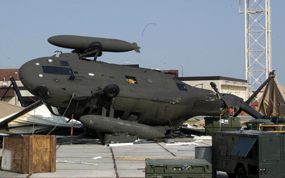 This Black Hawk helicopter assigned to Company B, 5th Battalion, 159th Aviation Regiment was flipped when the clamshell structure it was housed in at Aviano Air Base was destroyed by strong winds during a storm in late June. The damage to the helicopter could reach $1.8 million.