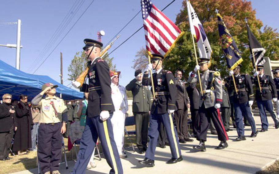 The color guard performs during a Veterans Day ceremony Saturday at Yongsan Garrison, South Korea.