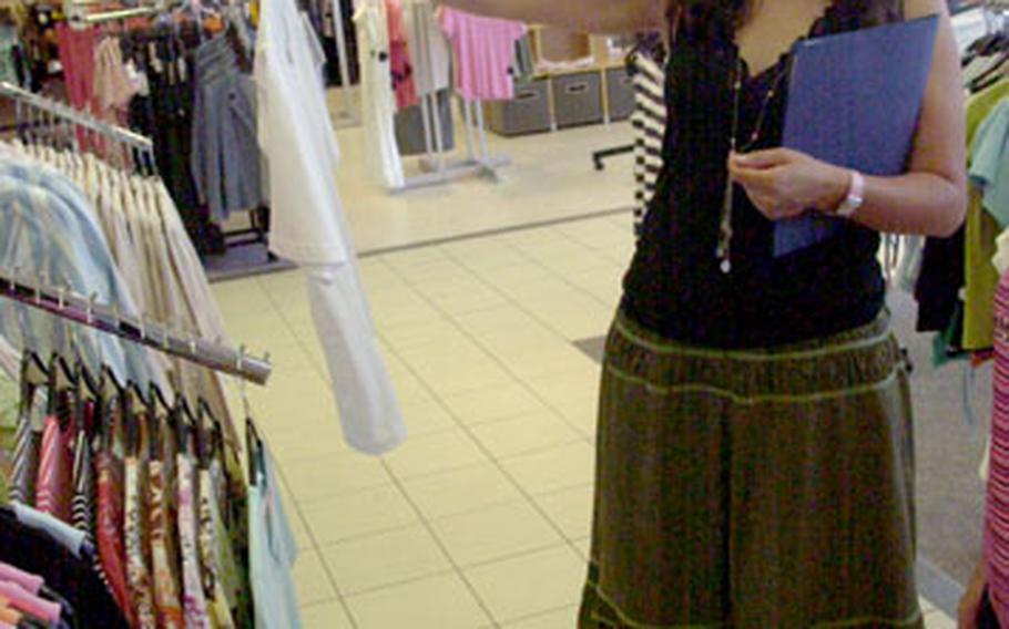 Second Cavalry (Stryker) Regiment spouse Raquel Girard, 35, checked out clothing at Kaufland, a shopping mall in Amberg, in July.