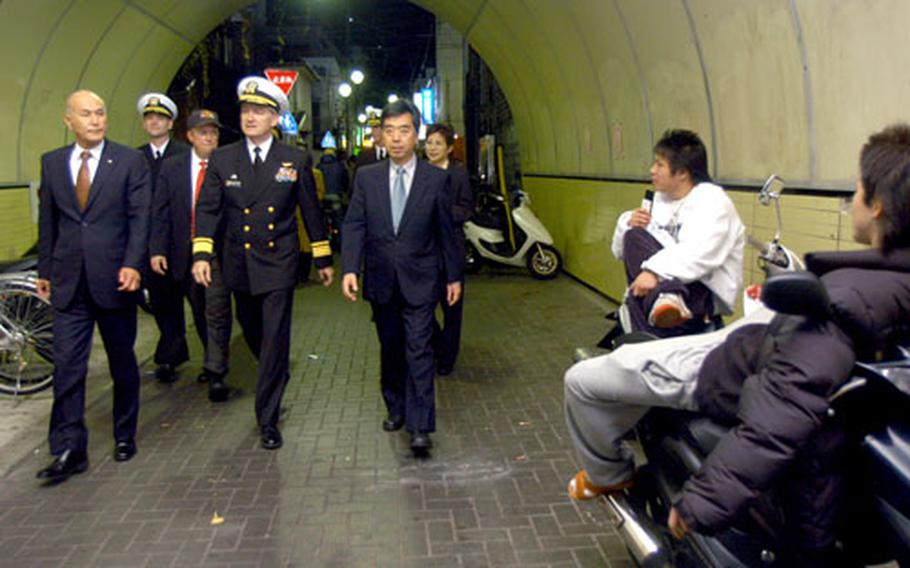 Local Navy and Japanese officials did a safety walk-through of the Honch nightclub district in Yokosuka, Japan, on Monday.