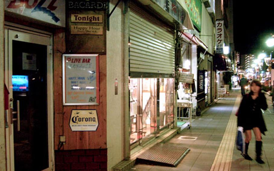 Live Buzz Bar, on Highway 16 across the street from Yokosuka Naval Base, Japan, was the site of an early November incident that resulted in the death Tuesday of a Japanese man.