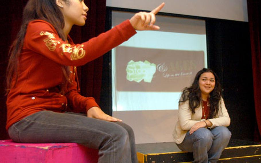 Nile C. Kinnick seniors Monique Rose and Jessica Traufler rehearse a scene from “Stages and Ages,” a student production about teenage life. Performances are to start Thursday at Yokosuka Naval Base’s Little Theater.