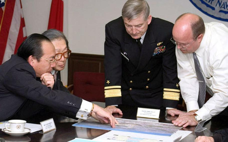 Yokosuka’s second Rental Partnership Program agreement was struck Nov. 14 when Commander Naval Forces Japan Rear Adm. James D. Kelly, center, met with Takara House Corporation officials.