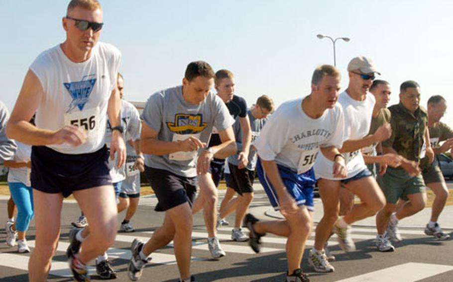 Runners set off Friday in the Marine Corps/MWR Toys for Tots race at Yokosuka Naval Base. Instead of entrance fees, runners brought toys to give to underprivileged children over the holidays. Toy collection drives also will be held outside Yokosuka's Navy Federal Credit Union and the Navy Exchange.