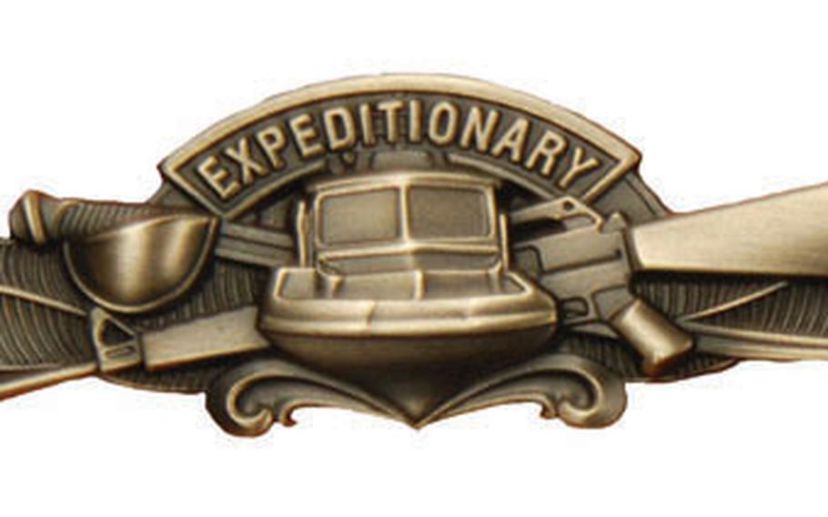 The new expeditionary warfare pin is to be awarded to sailors on sea duty who are permanently assigned to Naval Expeditionary Combat Command.