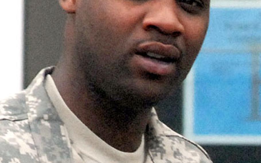 Spc. Bobby Morrissette leaves the staff judge advocate's building on Kleber Casern in Kaiserslautern, where is Article 32 hearing took place on Wednesday.