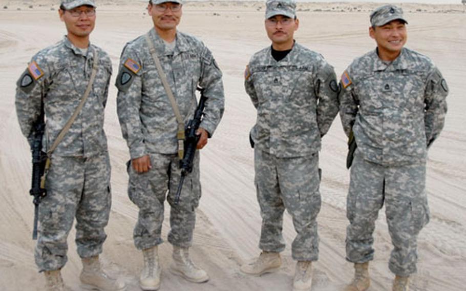 Brothers Sgt. Teddy Charles and Sgt. Andrew Charles and brothers Staff Sgt. Michael Uttereyuk and Sgt. 1st Class Frances Uttereyuk, at Camp Virginia in Kuwait. The Alaska Army National Guard soldiers are Yupik Eskimos and live in isolated villages in a part of Alaska that lacks roads. Both sets of brothers say they are seeing much more of each other in Kuwait than they do at home in Alaska.