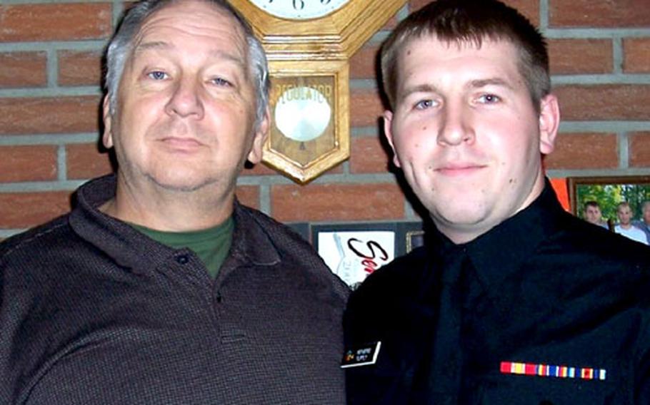Joshua Isenberg, right, poses for a photo with his father, David, is the family’s Hartford City, Ind., home. Last month, Joshua donated one of his kidneys to his father, who has been undergoing dialysis treatment for the past nine months.