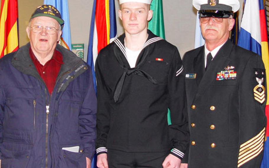 Seaman Jack Valentine, posing with his grandfather Bernard DeVries and dad, David Valentine, was killed after steam leaked into the USS Frank Cable’s fire room. His mother, Colleen Valentine, said the ship’s captain told the families that Valentine and seven other sailors injured in the incident shut down equipment before attempting to escape.