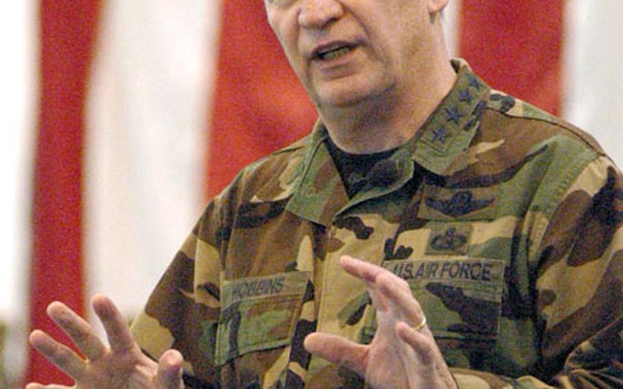 Gen. Tom Hobbins, commander of U.S. Air Forces in Europe, told thousands of assembled airmen at Aviano Air Base, Italy, on Thursday that the service’s planned reduction might not be as steep as previously announced.