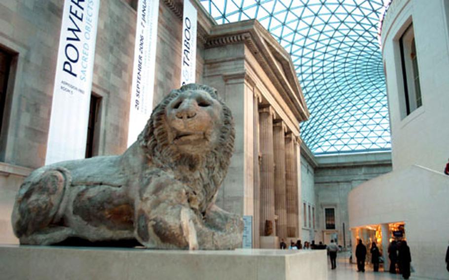 A statue of a lion greets visitors in the cavernous Great Court in London&#39;s British Museum.