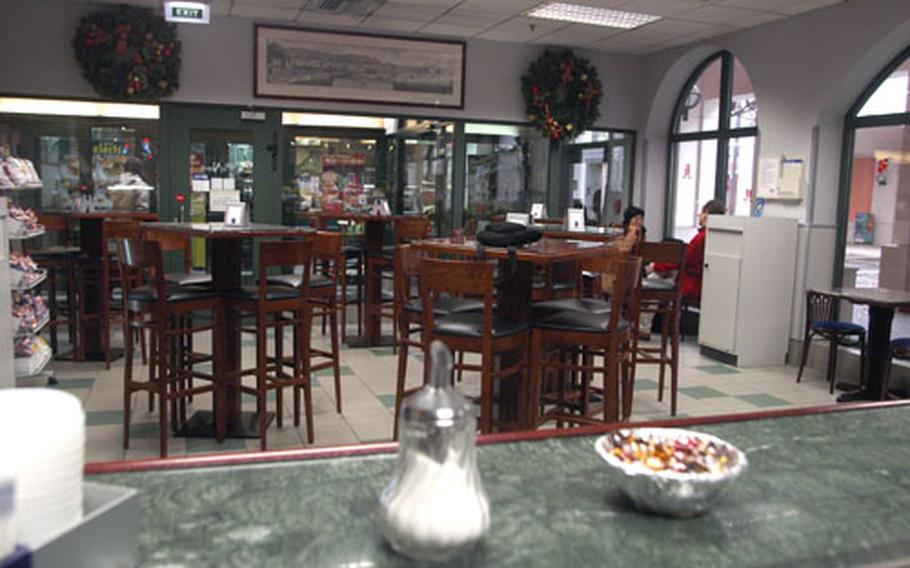Ordinarily on a Tuesday morning, the Italian cafe on Capodichino base of Naval Support Activity Naples would be bustling with activity. But like much of the naval base, it was empty save for a few stragglers due to the national day of mourning for former President Gerald R. Ford.