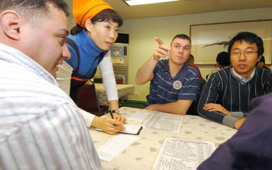 Soldiers order lunch at a Korean restaurant last month during an orientation program from the 19th Sustainment Command (Expeditionary) at Camp Henry, South Korea.