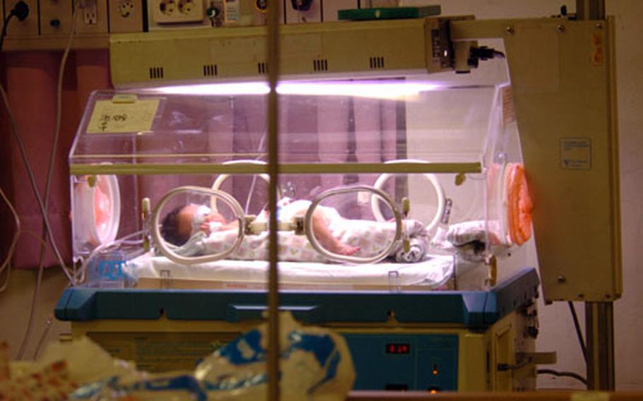 A baby is cared for in the neo-natal intensive care unit at the Keimyung University Dongsan Medical Center in Daegu, South Korea. About two women from the U.S. military community a month deliver their babies at the South Korean hospital.