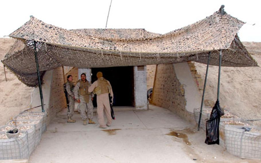 The entrance to one of the bunkers renovated by the Okinawa-based 9th Engineer Support Battalion Marines for Iraqi army soldiers. A company of soldiers lives in each bunker, which originally were dark and often cold.