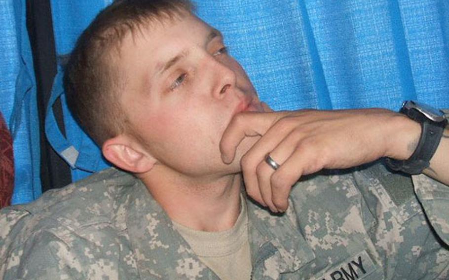 Sgt. John Michael Sullivan, photographed on a bus while his unit was in Kuwait in October before being moved to Baghdad.