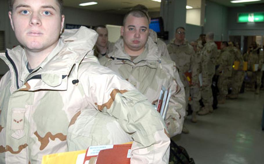 Airman 1st Class David Dracouless, 20, an electrical environmental technician with the 35th Maintenance Squadron, was near the front of a line of about 100 Misawa airmen who were getting ready to deploy to Iraq Wednesday morning from the base passenger terminal.