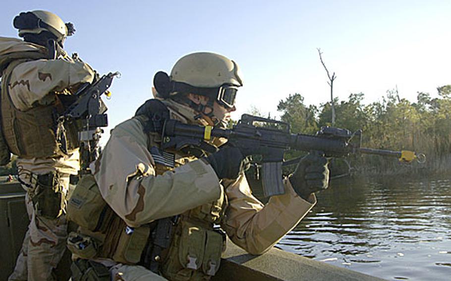 Sailors assigned to Riverine Squadron One prepare for their final exercise and evaluations near Camp Lejeune, N.C., in December. The Navy Expeditionary Combat Command, formed last year and tasked with taking the war inland, has resurrected the Navy&#39;s riverine capability.