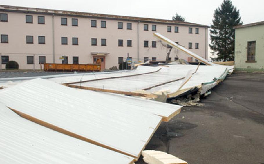The windstorms that raged across Europe last week tore the roof off a building at Wetzel Kaserne in Baumholder, Germany, on Thursday. Engineers, contractors and public works officials spent Monday surveying the damage, which also included a fence and a motor pool garage at other bases in the garrison.