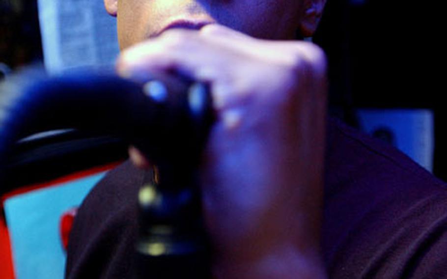Rapper Daytona 5 Bill - or Staff Sgt. Garland Wyatt - shown performing.