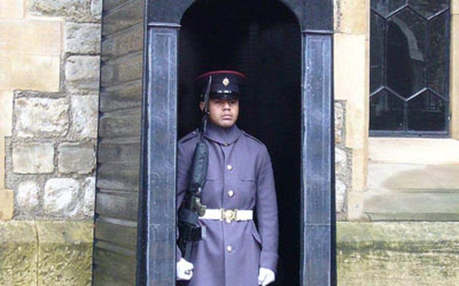 A guard stands outside a building where the Crown Jewels are featured. Even though the sparkling crowns and orbs of the royal collection are worth a photo, no photography is allowed inside the building.