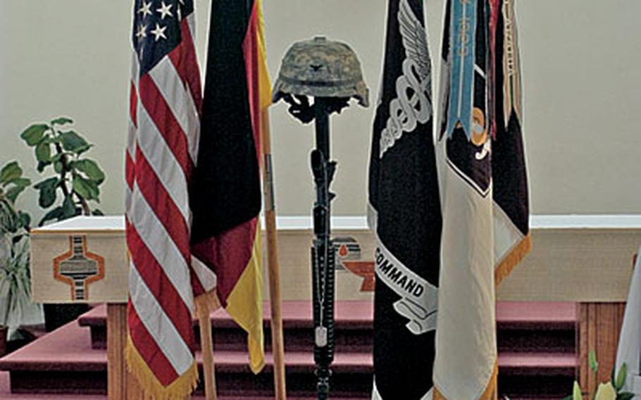 A display at the memorial ceremony in Heidelberg, Germany, for Col. Brian D. Allgood. Allgood was among 12 U.S. troops killed when a Black Hawk helicopter crashed Jan. 20 in Iraq.