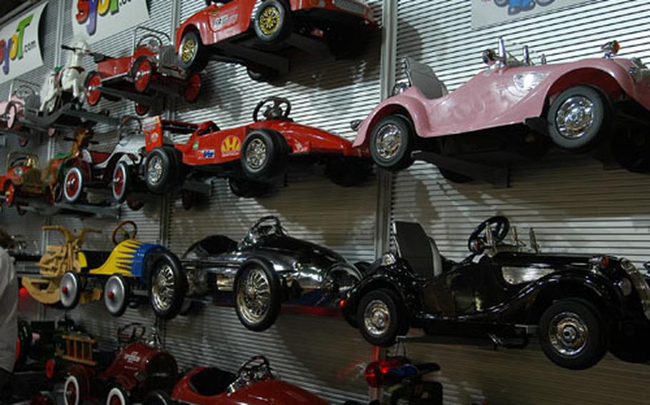 A wall of vehicles built for children at the Syot.com stand at the London Toy Fair.