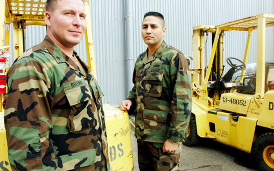 Seabees 1st Class Petty Officer Christopher Brown, left, and 1st Class Petty Officer Paul Ramirez are looking for information about what happened to the man they pulled off the Tokyo Metro subway tracks on the morning of Jan. 20 at Roppongi Station.