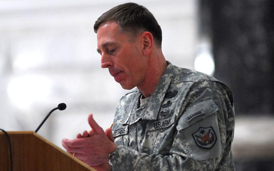 Gen. David H. Petraeus, new top commander of coalition forces in Iraq, speaks during a formal transfer of command ceremony Saturday at Camp Victory in Baghdad.
