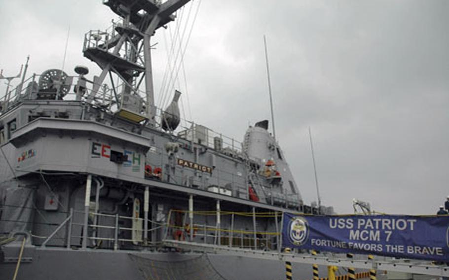 The USS Patriot pulled into the harbor at Iwakuni Marine Corps Air Station, Japan, this week, the first time a Navy ship has docked at a Marine harbor. The Iwakuni base is the only Marine base to have a harbor; Marines in other parts of the world use harbors controlled by other military branches, according to military officials.