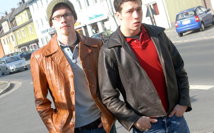Grafenwöhr locals John Sligh, left, and Alan Sligh, say they knew their brother, Chris, would become famous. Chris Sligh is the betting favorite to win American Idol.