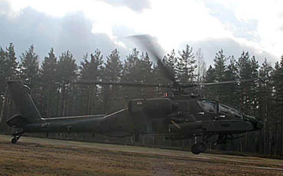 A 2nd Battalion, 159th Aviation Regiment Apache attack helicopter takes off at the Grafenwöhr, Germany, airstrip Thursday.