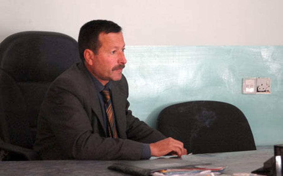 Mayor Mohamed Moshen Ali sits in his office in the city of Zaab on Feb. 22.