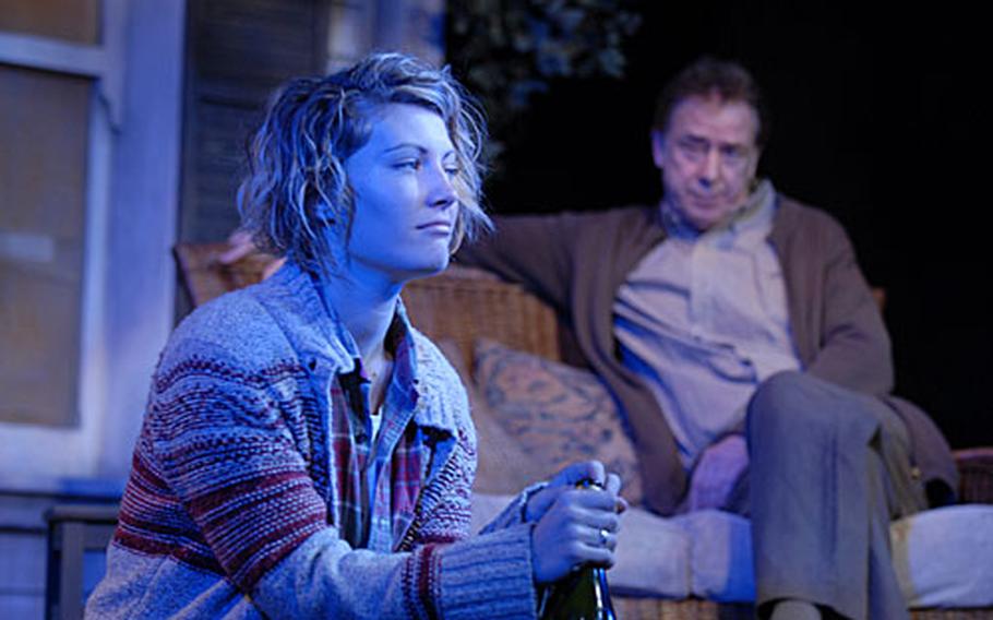 Sally Oliver, playing Catherine, and Terence Booth, who plays Robert, share a scene in "Proof." The American play is making another showing on London's West End through March 17 at the Arts Theatre London.