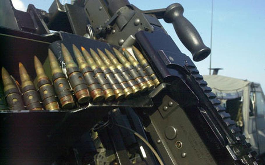 The U.S. Navy’s 82-foot MK V craft is heavily armed with everything from .50 caliber machine guns to shotguns and 9 mm pistols to M-203 grenade launchers.