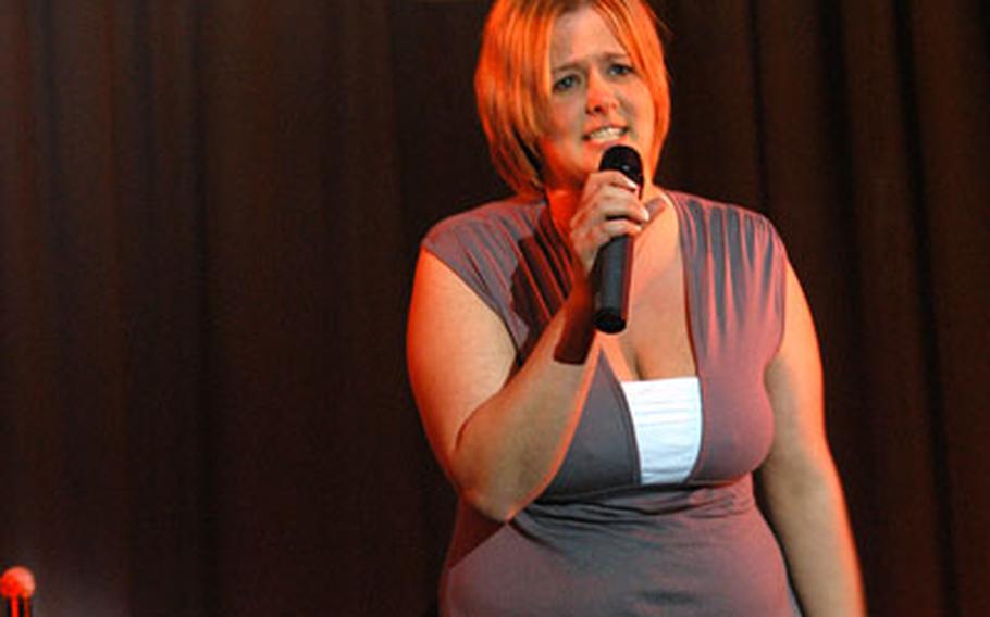 Air Force spouse Amie Lea Heller rocked the crowd with an impassioned rendition of "I will survive" by Gloria Gaynor.