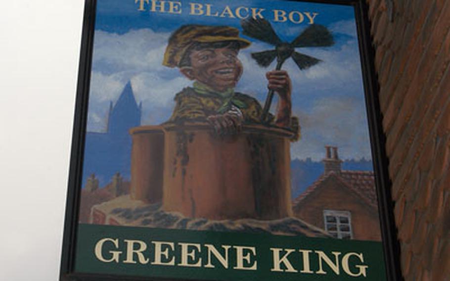 The sign hanging in front of The Black Boy.