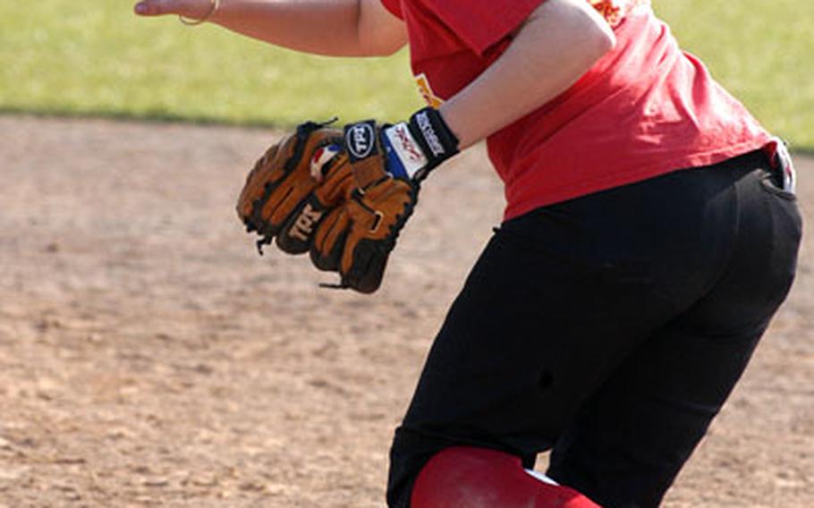 Lakenheath Lancers second baseman Maggie Pforts rushes to field a ground ball recently in practice before the team's first official game against Stuttgart, Germany.